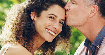 Buy stock photo Portrait of a happy and affectionate mature couple spending quality time together outdoors