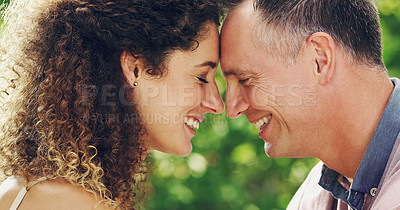Buy stock photo Shot of a happy and affectionate mature couple spending quality time together outdoors