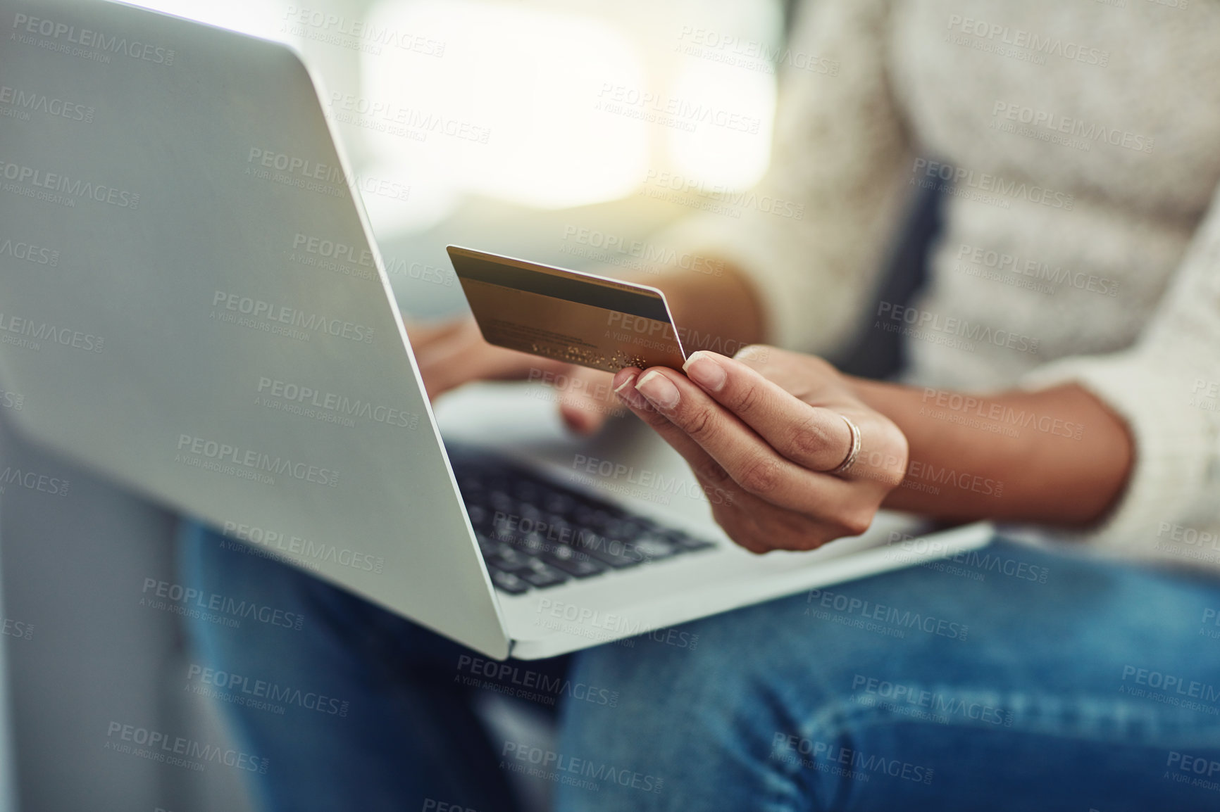 Buy stock photo Laptop, credit card and woman online shopping with payment on the internet on her home living room sofa. Ecommerce, computer and hands of person doing website payment on an app, connection or web
