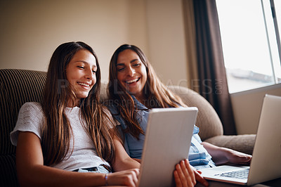 Buy stock photo Woman, teenager and technology in living room for streaming, e learning and bonding as family. People, happiness and internet for education, development and homework as mother and daughter in home