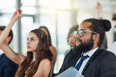 Buy stock photo Crowd, business people and hands raised for questions at conference, seminar or meeting. Group, audience and hand up for question, asking or answer, vote and training at workshop presentation event.