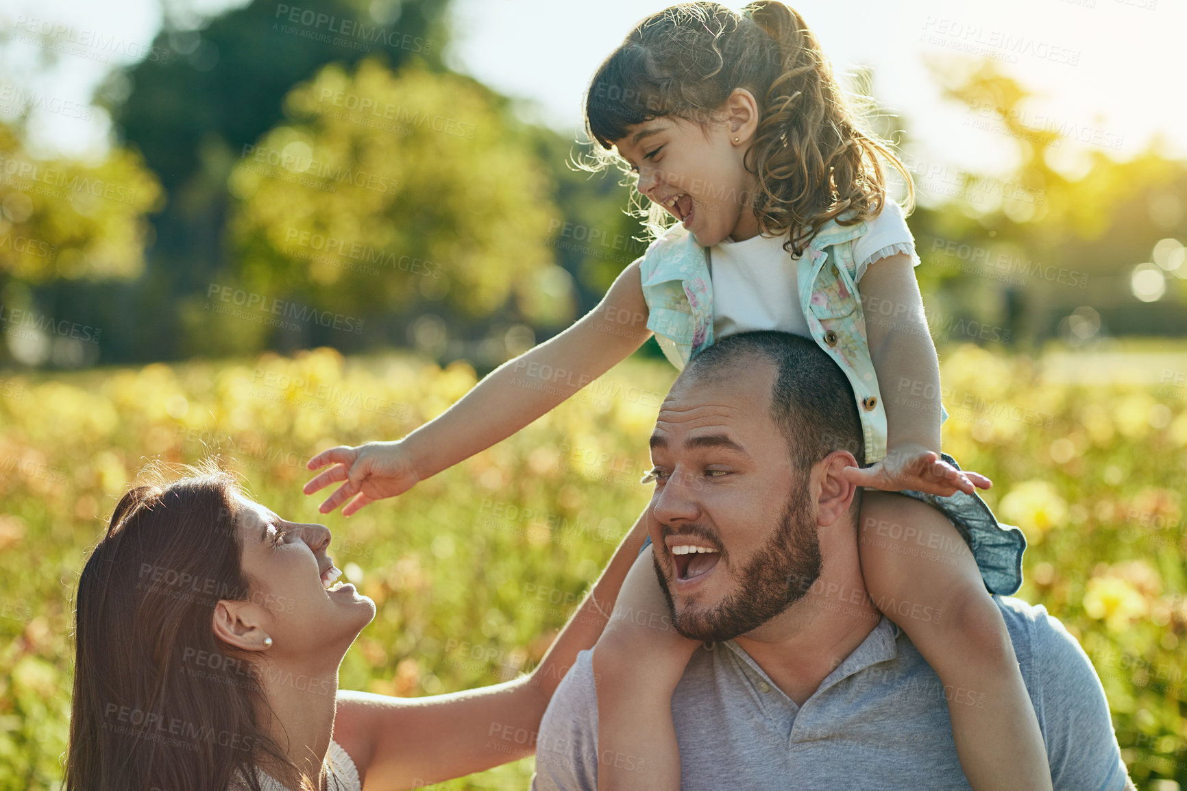 Buy stock photo Nature, parents and girl with happiness for airplane, connection and bonding together with smile. Countryside, mother and father with child for playful, childhood and carry on shoulders with singing