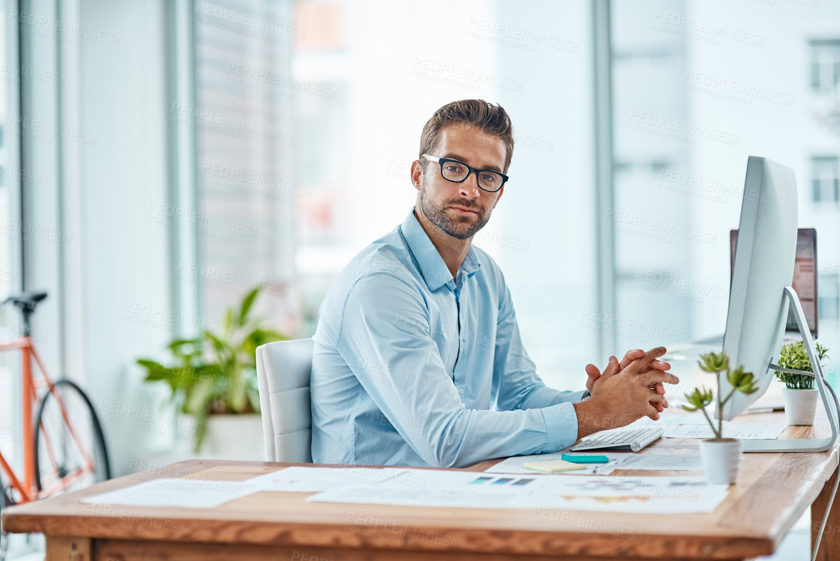 Buy stock photo Vision, portrait and man in office, computer and market research for social media manager, online and reading. Glasses, digital and working for agency, ideas and goal of project in morning and desk