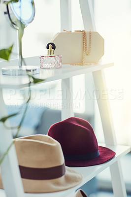 Buy stock photo Hat, handbag and fashion on display at shop with luxury product collection with design at shopping mall. Boutique, store and interior with shelf for fedora, perfume and bag with sale for trendy style