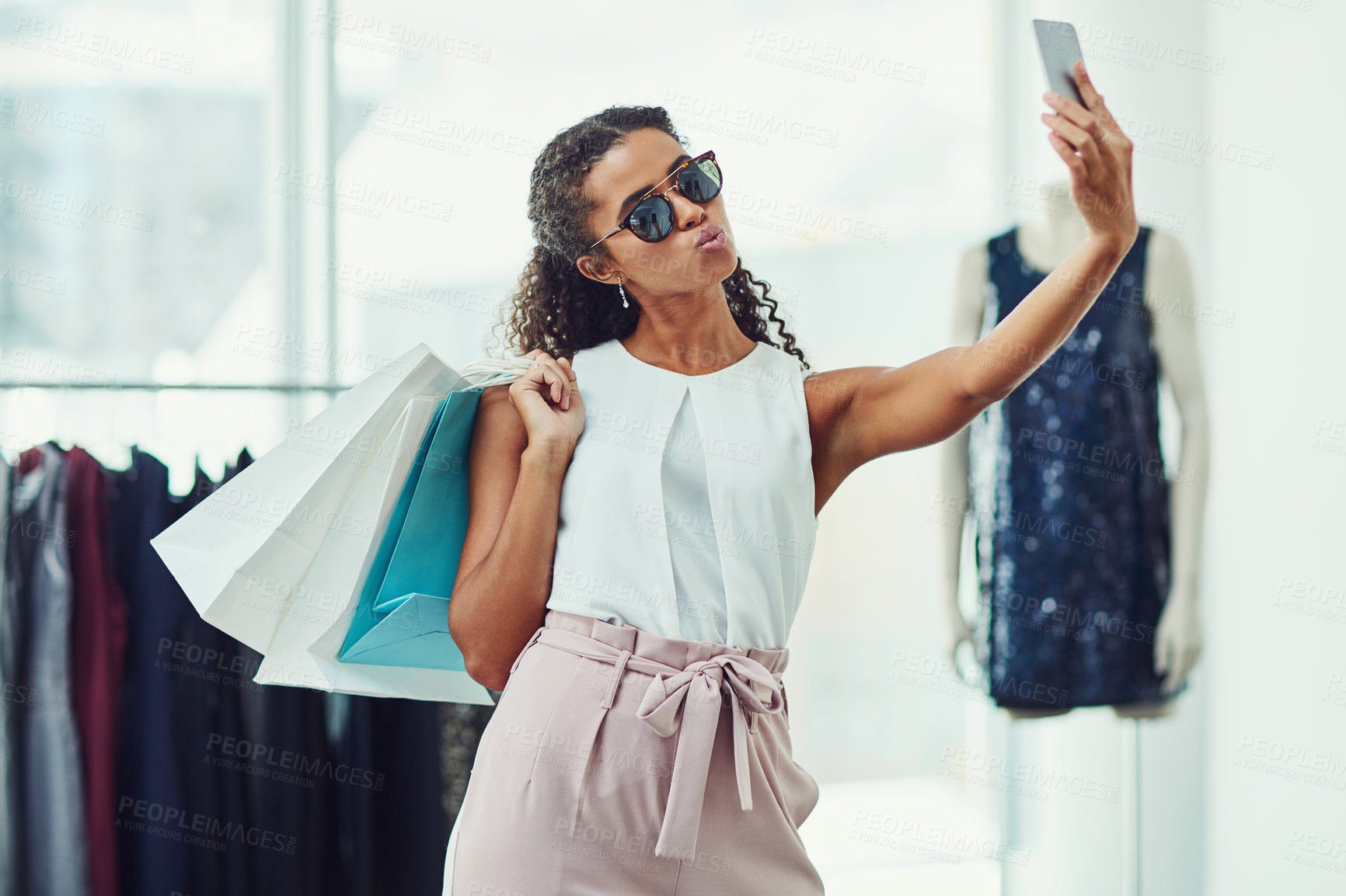 Buy stock photo Retail, store and woman in selfie with shopping bags, happy and smile while in boutique. Mall, clothes and girl customer excited for clothing sale, discount or outfit choice for New York fashion