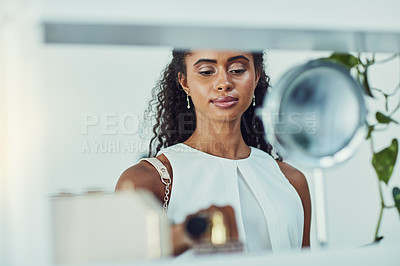 Buy stock photo Shot of an attractive young woman on a shopping spree in a boutique