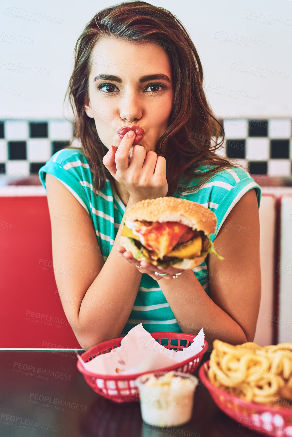 Buy stock photo Portrait, burger and woman with meal, taste and retro diner with food, eating and nutrition. Face, person and girl with snack, restaurant and relax with service, vintage and happiness with hunger