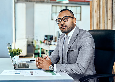 Buy stock photo Portrait of a young businessman working in an office