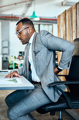 Buy stock photo Business man, back pain and stress with injury, bad posture and burnout with medical problem at office. Male corporate person at desk with backache, anatomy and health crisis with muscle tension