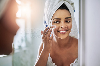 Buy stock photo Mirror, bathroom and woman with cream, cosmetics and dermatology with morning routine, self care and glow. Home, reflection and person with towel, grooming and beauty treatment for shine and wellness