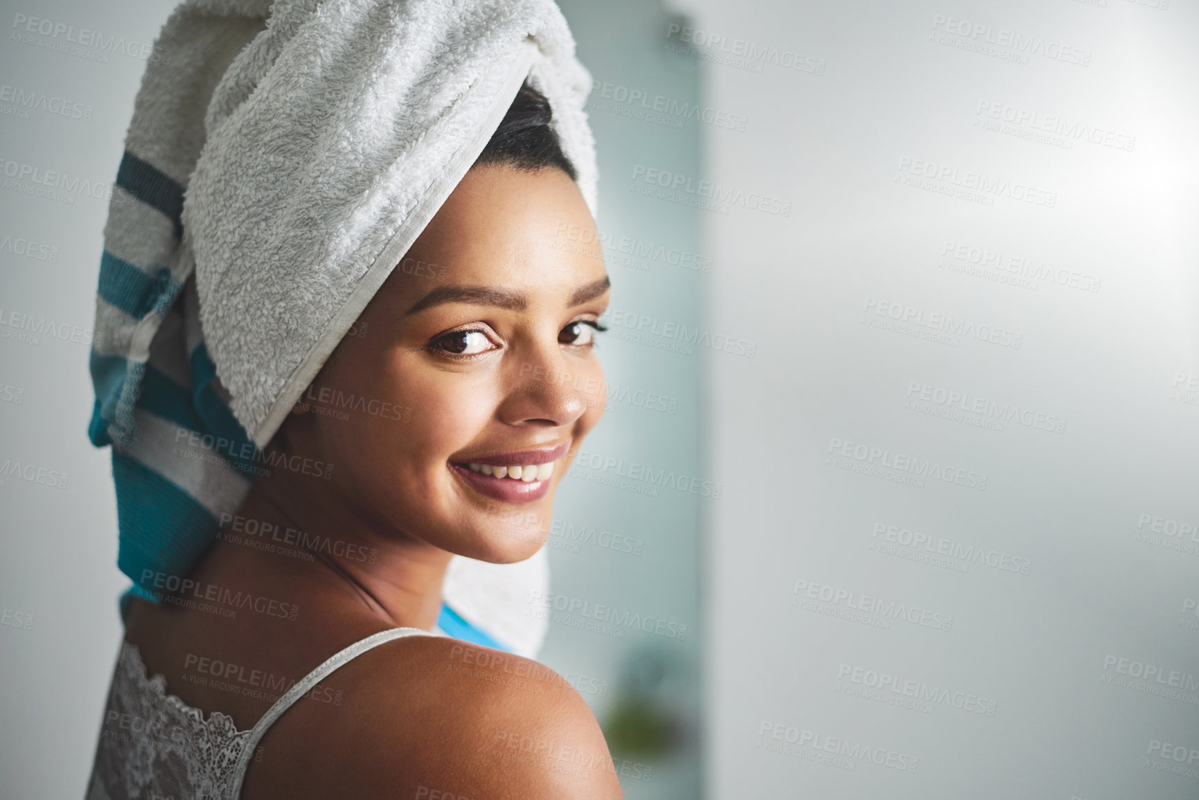Buy stock photo Portrait of an attractive young woman standing in the bathroom at home