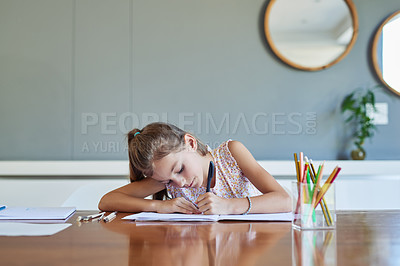 Buy stock photo Shot of a little girl doing her homework