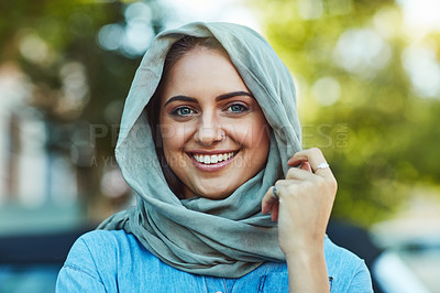 Buy stock photo Portrait of a young beautiful woman wearing a headscarf outside