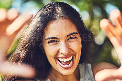 Buy stock photo Portrait of an attractive young woman spending the day outdoors
