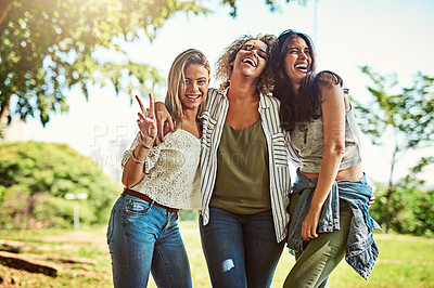 Buy stock photo Portrait of a group of friends bonding together outdoors