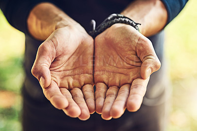 Buy stock photo Closeup shot of an unrecognizable man standing with his hands cupped together
