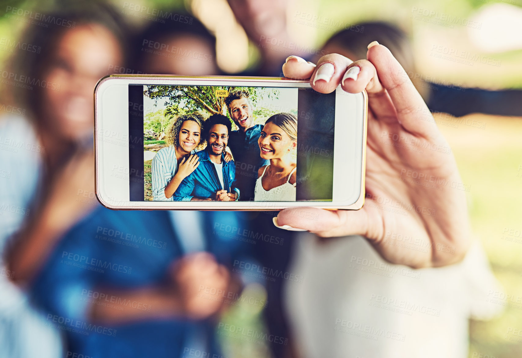 Buy stock photo Phone screen, selfie and social media with group of friends outdoor together for bonding, memory or reunion. Photograph, portrait and smile of people on display in garden or park for profile picture