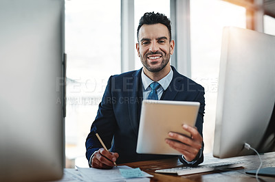 Buy stock photo Cropped shot of a handsome male executive working in a modern office