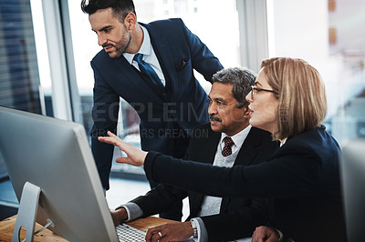 Buy stock photo Cropped shot of colleagues working together in a modern office