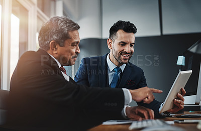 Buy stock photo Cropped shot of colleagues working together in a modern office