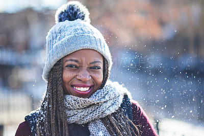 Buy stock photo Portrait of a beautiful young woman enjoying a wintery day outdoors