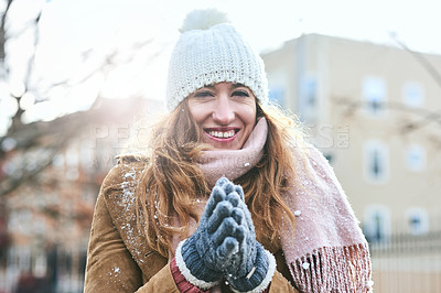 Buy stock photo Portrait of an attractive young woman enjoying being out in the snow