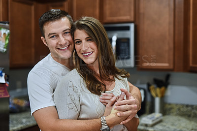 Buy stock photo Portrait, hug and house with couple in kitchen, bonding together with commitment. Face, apartment and man with woman, embrace and relationship with romance, marriage and morning with smile and love 