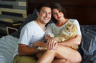 Buy stock photo Portrait, cat and house with couple in bedroom, bonding together and commitment. Face, apartment or man with woman, feline and relationship with romance, marriage or morning with animal, pet or love 