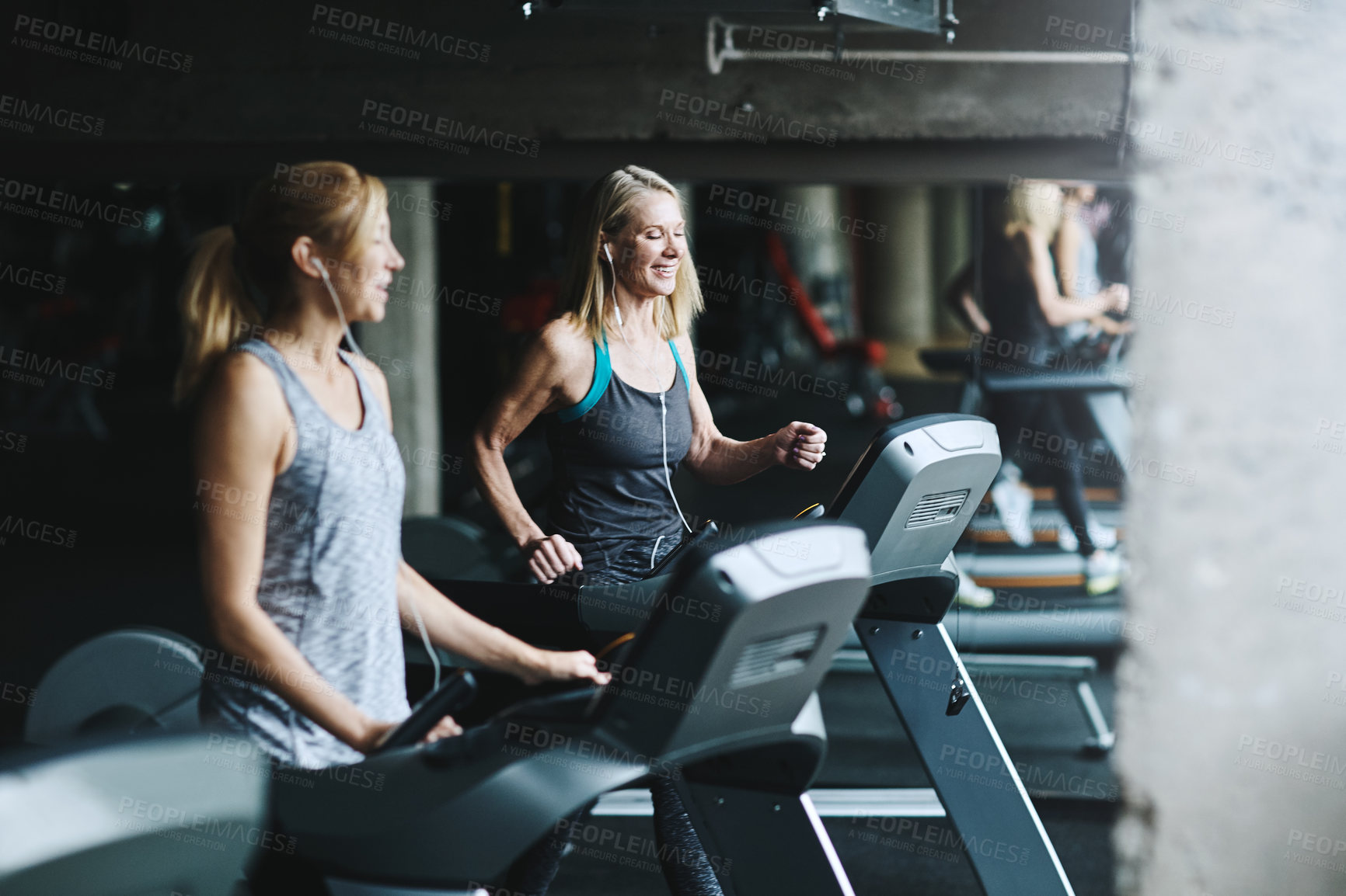 Buy stock photo Shot of mature women working out in the gym