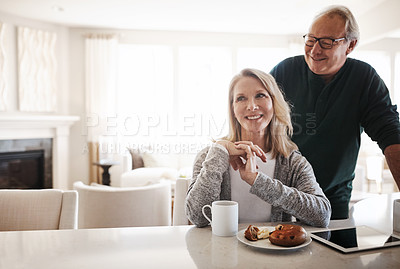 Buy stock photo Shot of a senior married couple spending time together at home