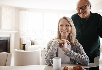 Buy stock photo Shot of a senior married couple spending time together at home