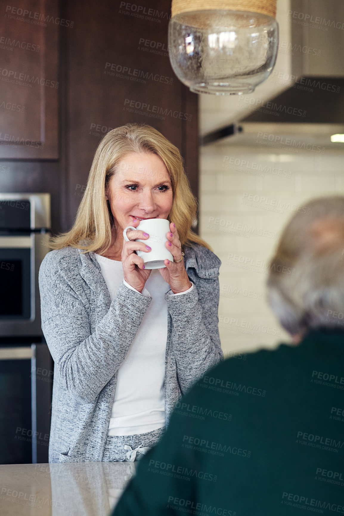Buy stock photo Cropped shot of a senior married couple spending time together at home