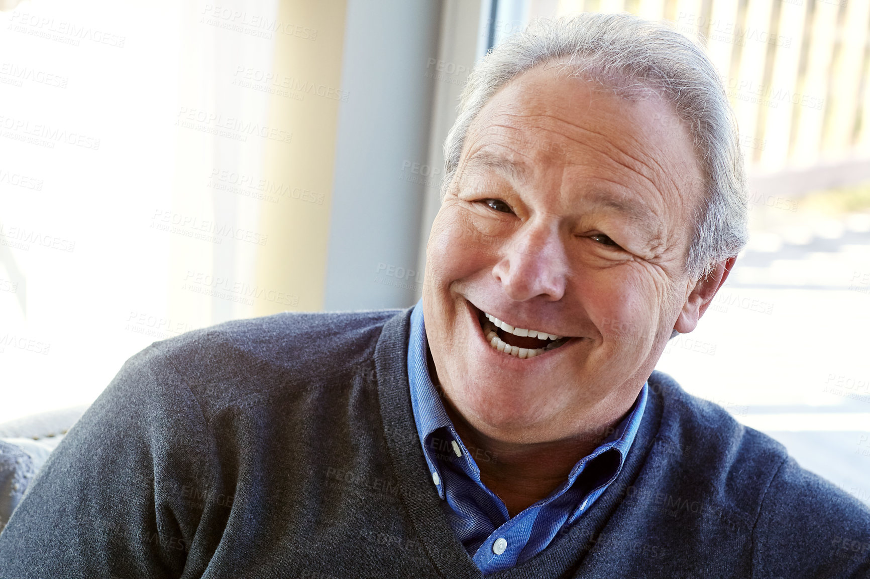 Buy stock photo Cropped shot of a senior man relaxing at home