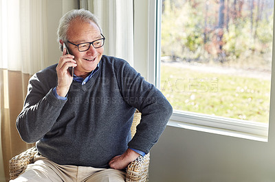 Buy stock photo Cropped shot of a senior man on a call at home