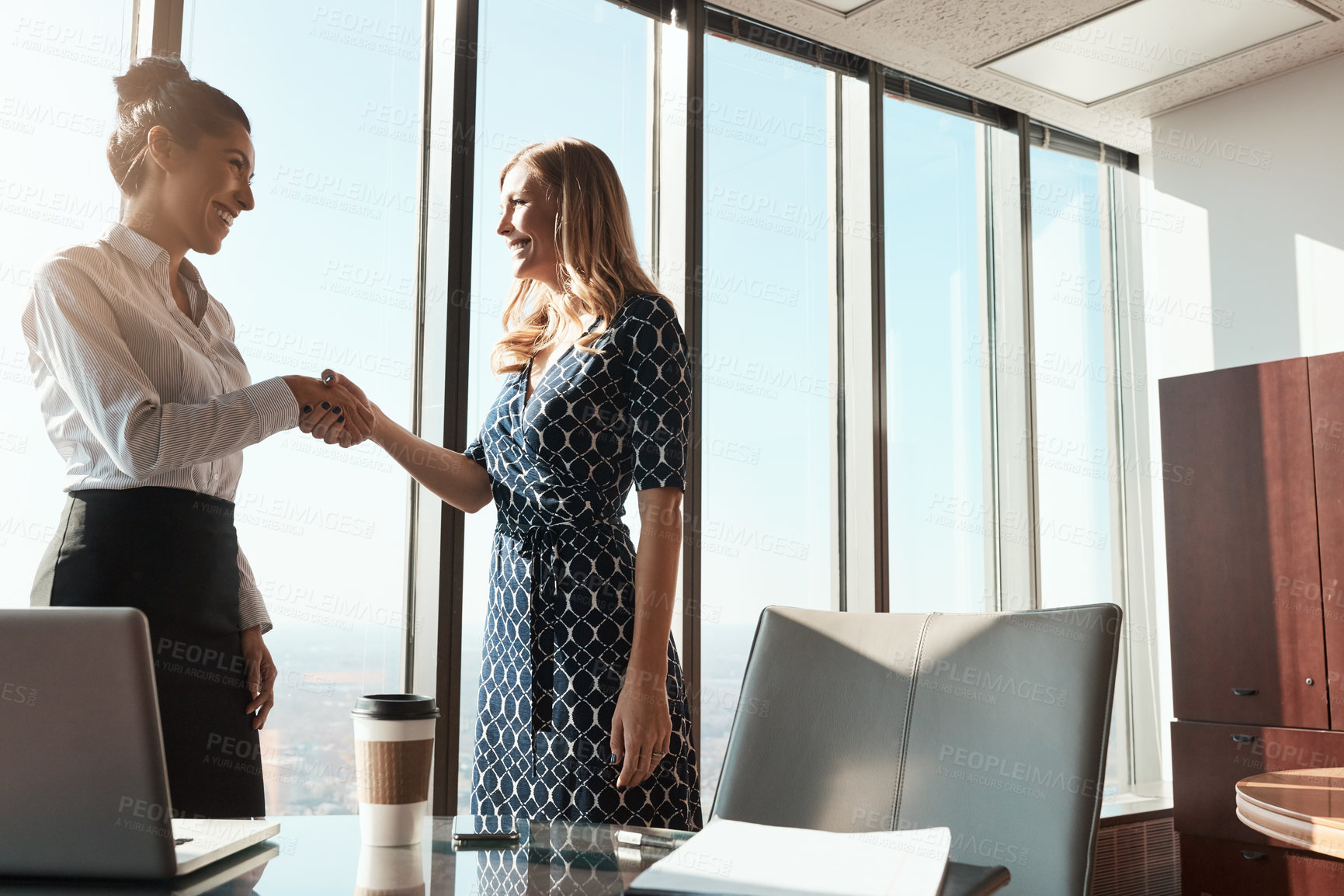 Buy stock photo Business, women or handshake for interview success in office with partnership, paralegal intern and offer. Law firm, lawyer and shaking hands for welcome, introduction or congratulations in boardroom