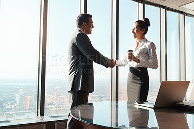 Buy stock photo Shaking hands, coffee and business people in office with deal, merger or b2b corporate partnership. Meeting, welcome and finance banker with investment client for agreement handshake in workplace.