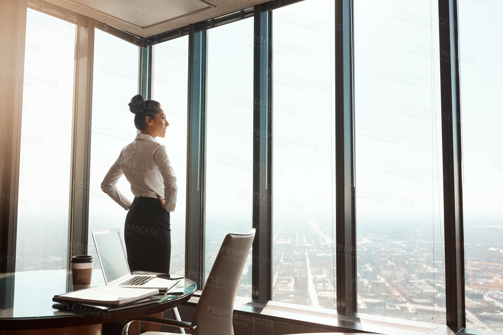 Buy stock photo Business woman, office window and thinking of ideas, plan or vision in city building. Professional female entrepreneur person with hands on hips for motivation or inspiration for corporate career