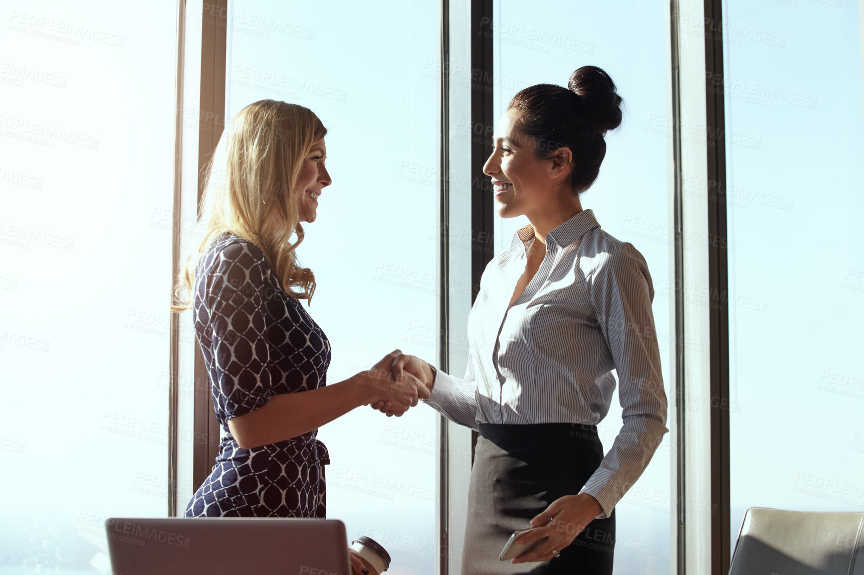 Buy stock photo Business, women and handshake in office for deal, vendor and trade collaboration for partnership. Contract managers, shaking hands and happy for company, negotiation and supply chain agreement.