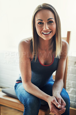 Buy stock photo Cropped portrait of an attractive young sportswoman sitting on a wooden chair