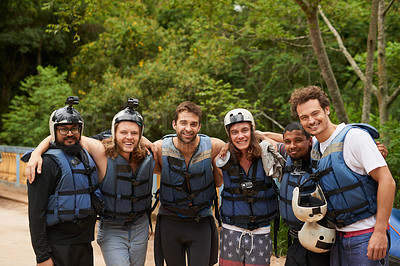 Buy stock photo Portrait of a group of young male friends before going  white water rafting