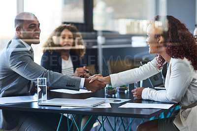 Buy stock photo Boardroom, meeting and business people with handshake for partnership, agreement and success for b2b deal. Glass office, teamwork and employees with shaking hands for welcome, greeting and thank you