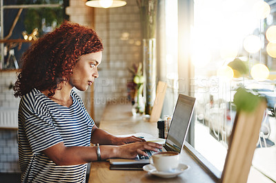 Buy stock photo Woman, laptop and remote work with typing at cafe, editing and profile for creative process in morning. Person, freelance writer and proposal with notes, click and computer by window at coffee shop