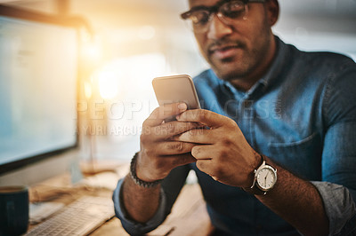 Buy stock photo Night, business and man with a smartphone, typing and connection for social media, network or communication. Male person, employee or consultant with a cellphone, evening or texting to search website