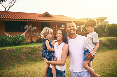 Buy stock photo Family, laugh and new home with father, mother and kids with happiness and love. Outdoor, bonding and lens flare of a mom, dad and children together in a garden and backyard with a smile and care