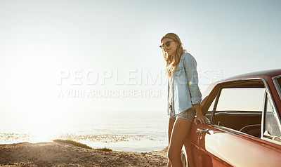 Buy stock photo Shot of a beautiful young woman going on a road trip to the beach