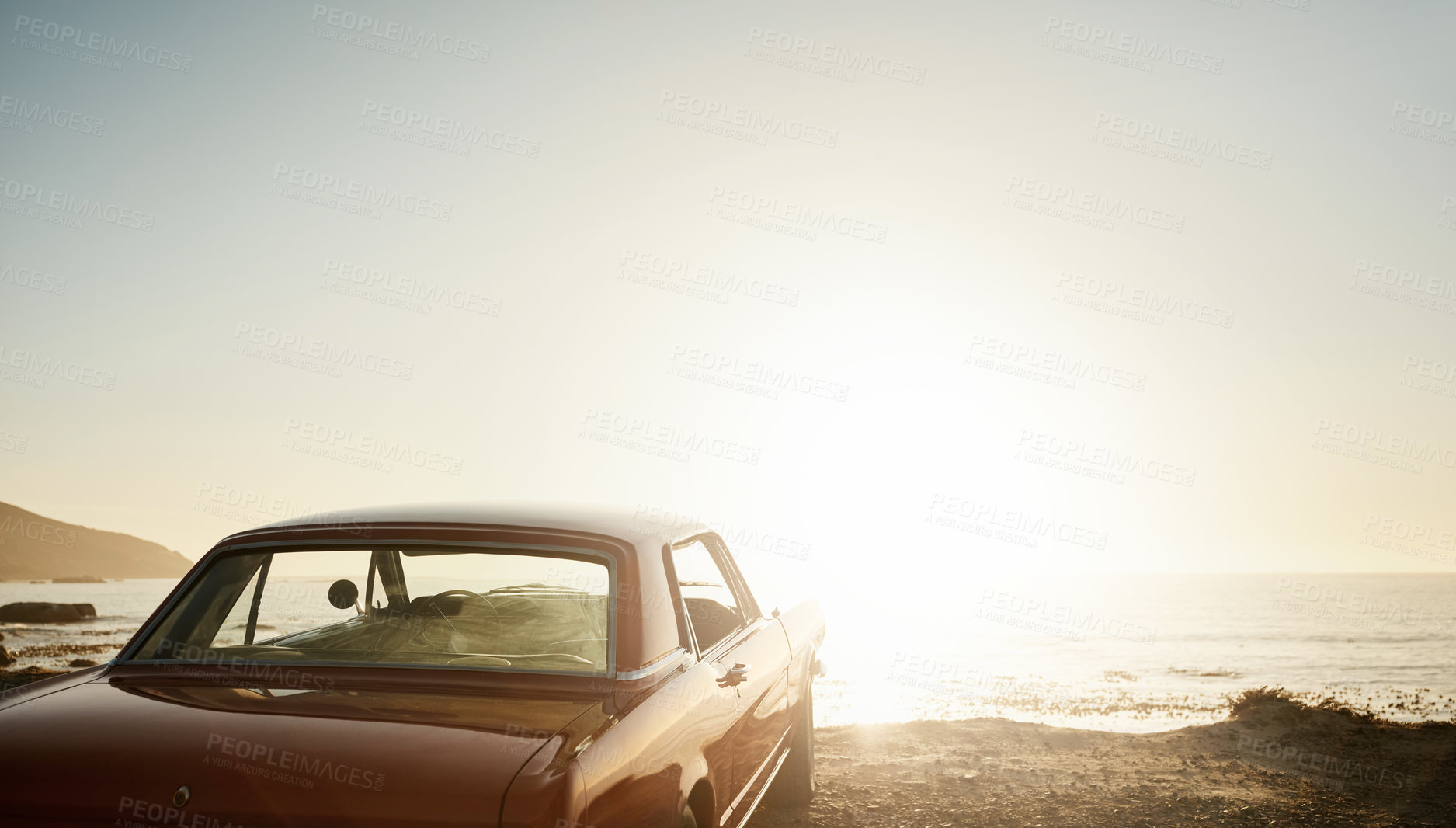 Buy stock photo Still life shot of a car parked along the coast at dusk