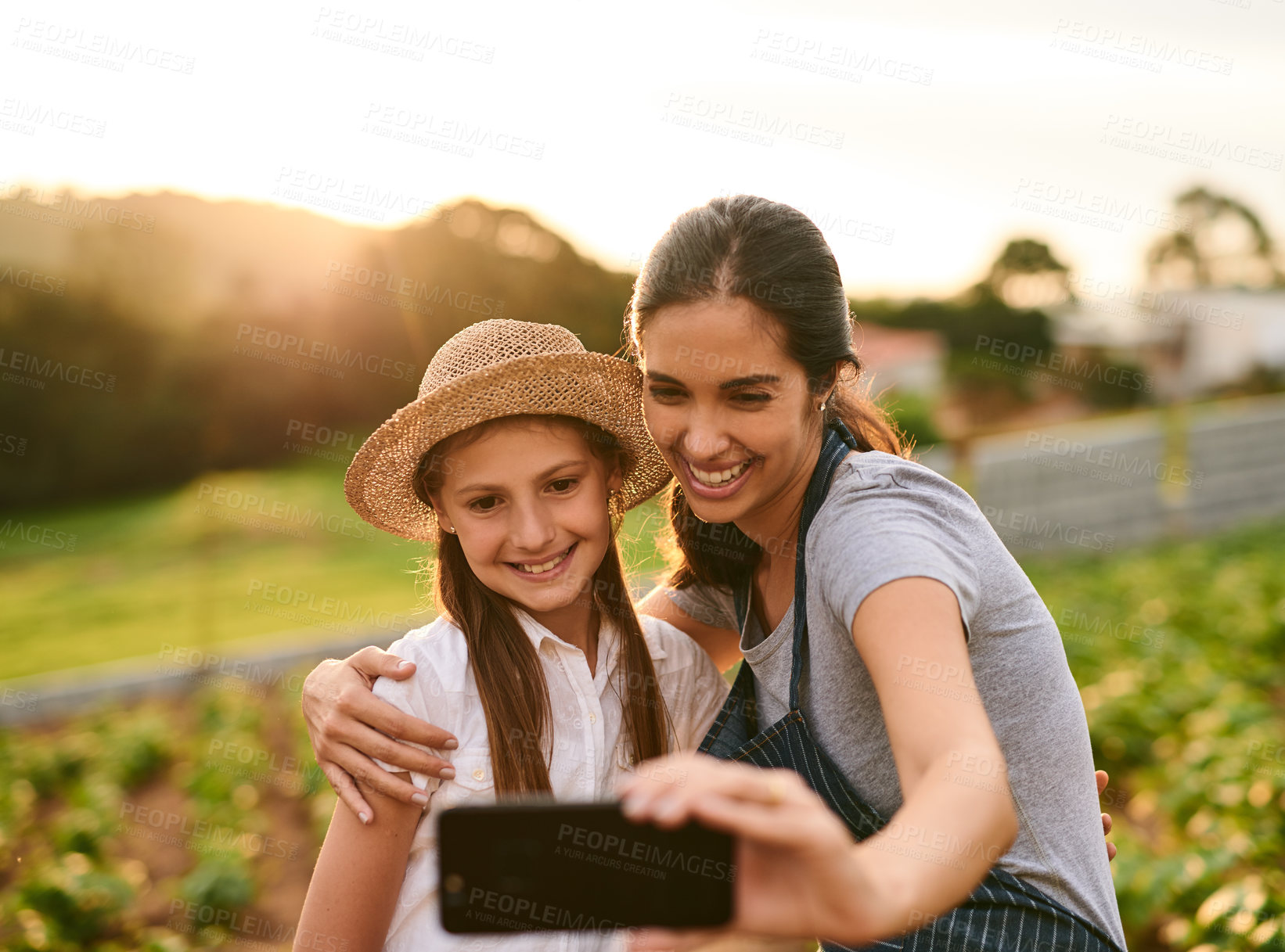 Buy stock photo Gardening, selfie and woman with daughter, outdoor and sustainability for environment. Mother, girl child and countryside, confident and eco friendly for photography and memory with kid in garden