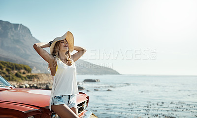 Buy stock photo Cropped shot of an attractive young woman on a road trip