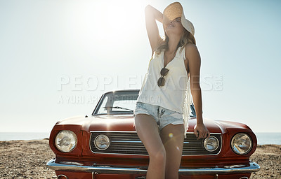 Buy stock photo Cropped shot of an attractive young woman on a road trip