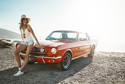 Buy stock photo Shot of an attractive young woman on a road trip